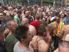 Muscle slave is stripped naked, used and humiliated while hordes of people take photos.