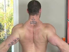 Jaxton Wheeler is one hung bodybuilder, with his sexy buzzcut, neatly trimmed beard and jock muscle body.