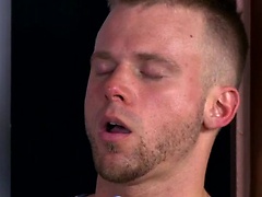 Cameron Marshall jerks his big thick cock after voyeuristically watching a couple of horny muscle studs get it on.