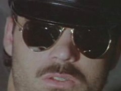 Horny leatherman strokes his massive tool to reach orgasm