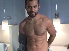 Hairy muscle man Lonzo Zolar jerking off dick