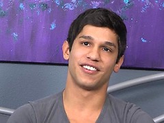 Carmine posing naked in a bedroom